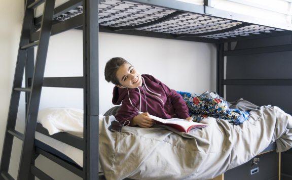 19-years-old student girl in the campus’s dormitory  room