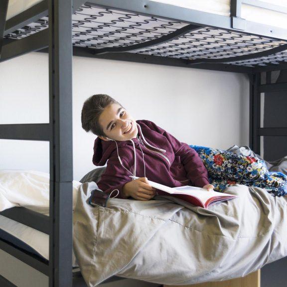 19-years-old student girl in the campus’s dormitory  room